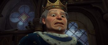 Movie still from “Shrek Forever After” (2010), directed by Mike Mitchell – An old man wearing a gold crown with a surprised look on his face; Close Up shot, Low angle