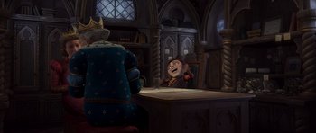 Movie still from “Shrek Forever After” (2010), directed by Mike Mitchell – A cartoon character is sitting at a table; Medium shot, Over the shoulder angle