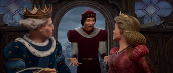 Movie still from “Shrek Forever After” (2010), directed by Mike Mitchell – A man and two women are talking to each other; Medium shot, Over the shoulder angle