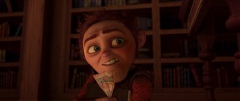 Movie still from “Shrek Forever After” (2010), directed by Mike Mitchell – A cartoon character with green eyes holding a book; Close Up shot, Over the shoulder angle