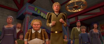 Movie still from “Shrek Forever After” (2010), directed by Mike Mitchell – An animated scene of a man and a boy; Medium shot, Over the shoulder angle