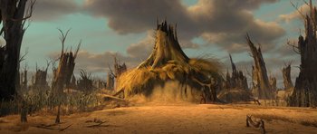 Movie still from “Shrek Forever After” (2010), directed by Mike Mitchell – An image of an animated scene with a tree stump in the middle of the desert; Extreme Wide shot, Low angle