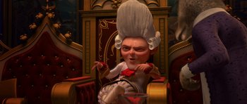 Movie still from “Shrek Forever After” (2010), directed by Mike Mitchell – A cartoon of a man in a white wig and a white dress; Medium shot, High angle