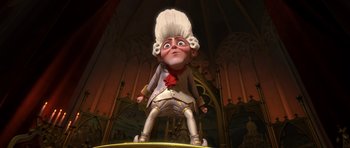 Movie still from “Shrek Forever After” (2010), directed by Mike Mitchell – A cartoon of a man with a white wig and a white beard; Medium shot, Low angle