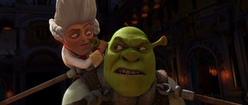 Movie still from “Shrek Forever After” (2010), directed by Mike Mitchell – A man and a woman are sitting next to each other; Close Up shot, Over the shoulder angle