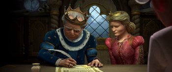 Movie still from “Shrek Forever After” (2010), directed by Mike Mitchell – An old man and a young woman are writing a letter; Medium shot, Over the shoulder angle