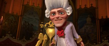 Movie still from “Shrek Forever After” (2010), directed by Mike Mitchell – A man with a wig holding a gold goblet in his hand; Medium shot, Over the shoulder angle