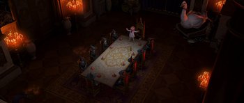 Movie still from “Shrek Forever After” (2010), directed by Mike Mitchell – A group of people sitting around a table; Extreme Wide shot, High angle