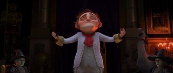Movie still from “Shrek Forever After” (2010), directed by Mike Mitchell – An animated character with his arms outstretched; Medium shot, Low angle