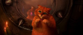 Movie still from “Shrek Forever After” (2010), directed by Mike Mitchell – An orange cat is brushing its teeth in a mirror; Medium shot, High angle