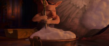 Movie still from “Shrek Forever After” (2010), directed by Mike Mitchell – A pig is holding a beer in his mouth; Close Up shot, Low angle