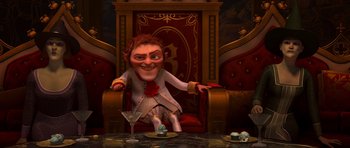 Movie still from “Shrek Forever After” (2010), directed by Mike Mitchell – An animated character sitting in a chair with a martini glass in front of him; Wide shot, High angle