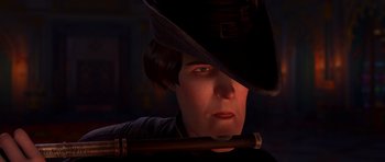 Movie still from “Shrek Forever After” (2010), directed by Mike Mitchell – A man in a hat holding onto a wooden stick; Close Up shot, Over the shoulder angle