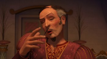 Movie still from “Shrek the Third” (2007), directed by Raman Hui – An animated man is making a funny face with his hand; Close Up shot, Over the shoulder angle