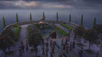 Movie still from “Shrek the Third” (2007), directed by Raman Hui – A group of people standing around a fountain; Extreme Wide shot, High angle