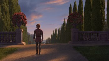 Movie still from “Shrek the Third” (2007), directed by Raman Hui – A man standing on the side of a road near trees; Wide shot, Over the shoulder angle
