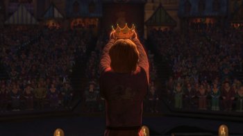 Movie still from “Shrek the Third” (2007), directed by Raman Hui – A man holding a crown in front of a crowd of people; Extreme Wide shot, Low angle