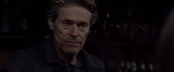 Movie still from “Siberia” (2020), directed by Abel Ferrara – A person wearing a jacket; Close Up shot, Over the shoulder angle