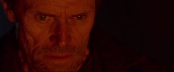 Movie still from “Siberia” (2020), directed by Abel Ferrara – A man's face in the dark; Extreme Close Up shot, Over the shoulder angle