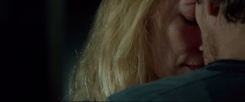 Movie still from “Siberia” (2020), directed by Abel Ferrara – View of a woman's blonde hair; Extreme Close Up shot, Over the shoulder angle