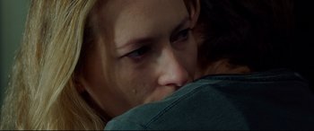 Movie still from “Siberia” (2020), directed by Abel Ferrara – A person with their eyes closed; Close Up shot, Over the shoulder angle