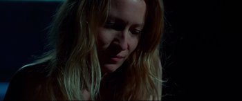 Movie still from “Siberia” (2020), directed by Abel Ferrara – A person with long blonde hair; Close Up shot, Low angle