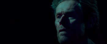 Movie still from “Siberia” (2020), directed by Abel Ferrara – A man's face in the dark; Extreme Close Up shot, Low angle