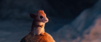 Movie still from “A Boy Called Christmas” (2021), directed by Gil Kenan – A mouse sitting on top of a piece of burlap; Extreme Close Up shot, High angle