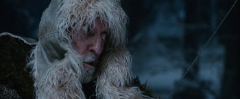 Movie still from “A Boy Called Christmas” (2021), directed by Gil Kenan – A person wearing a fur coat; Close Up shot, Low angle