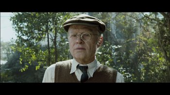 Movie still from “Side by Side” (2012), directed by Christopher Kenneally – An old man wearing glasses and a hat; Close Up shot, Over the shoulder angle