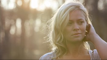 Movie still from “Side by Side” (2012), directed by Christopher Kenneally – A beautiful blonde haired woman in the sunlight; Close Up shot, Low angle