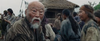 Movie still from “Silence” (2016), directed by Martin Scorsese – An old man with a long white beard; Close Up shot, Low angle