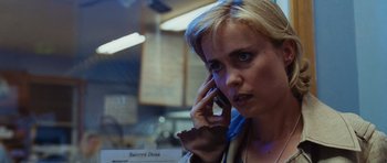 Movie still from “Silent Hill” (2006), directed by Christophe Gans – A person talking on a cell phone; Close Up shot, Low angle