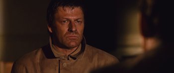 Movie still from “Silent Hill” (2006), directed by Christophe Gans – A person wearing a jacket; Close Up shot, Over the shoulder angle