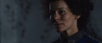 Movie still from “Silent Hill” (2006), directed by Christophe Gans – A woman's face in the dark; Close Up shot, Low angle