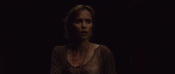 Movie still from “Silent Hill” (2006), directed by Christophe Gans – A woman with blood all over her face and neck; Close Up shot, High angle