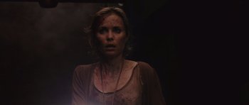 Movie still from “Silent Hill” (2006), directed by Christophe Gans – A person with blood all over her face; Close Up shot, Over the shoulder angle