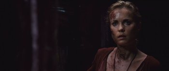 Movie still from “Silent Hill” (2006), directed by Christophe Gans – A person with blood all over her face; Close Up shot, Over the shoulder angle