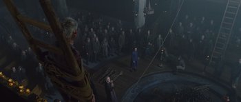 Movie still from “Silent Hill” (2006), directed by Christophe Gans – A group of people standing in front of a group of people; Wide shot, High angle