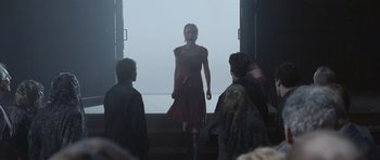 Movie still from “Silent Hill” (2006), directed by Christophe Gans – A group of people standing in front of an open door; Wide shot, Over the shoulder angle