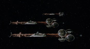 Movie still from “Silent Running” (1972), directed by Douglas Trumbull – A group of space ships flying in the night sky; Extreme Wide shot, Low angle