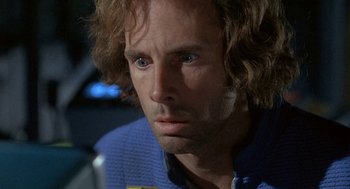 Movie still from “Silent Running” (1972), directed by Douglas Trumbull – A person wearing a blue shirt; Close Up shot, Over the shoulder angle