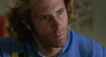 Movie still from “Silent Running” (1972), directed by Douglas Trumbull – A person wearing a blue shirt; Close Up shot, Low angle