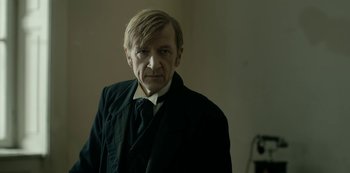 Movie still from “A Fortunate Man” (2018), directed by Bille August – Close Up shot, Over the shoulder angle