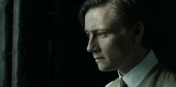 Movie still from “A Fortunate Man” (2018), directed by Bille August – Close Up shot, Over the shoulder angle