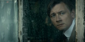 Movie still from “A Fortunate Man” (2018), directed by Bille August – Close Up shot, Over the shoulder angle