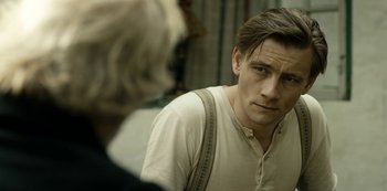 Movie still from “A Fortunate Man” (2018), directed by Bille August – Close Up shot, Over the shoulder angle