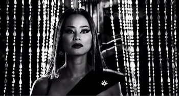 Movie still from “Sin City: A Dame to Kill For” (2014), directed by Frank Miller – A black and white photo of a woman with long black hair; Close Up shot, Low angle