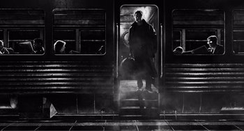Movie still from “Sin City: A Dame to Kill For” (2014), directed by Frank Miller – A man standing on a train platform with a bag; Wide shot, Low angle
