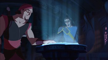 Movie still from “Sinbad: Legend of the Seven Seas” (2003), directed by Tim Johnson – A man in a blue shirt is sitting at a table with another man; Medium shot, Over the shoulder angle